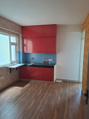 Kitchen in 1 BHK Apartment at ROF Aalayas, Sector 102 – for Sale