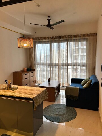 Living Room in 1 BHK Apartment at Lodha Crown Quality Homes, Majiwada – for Rent