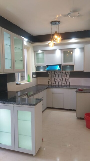 Kitchen in 4 BHK Apartment at Gaur Atulyam, Omicron I Greater Noida – for Sale