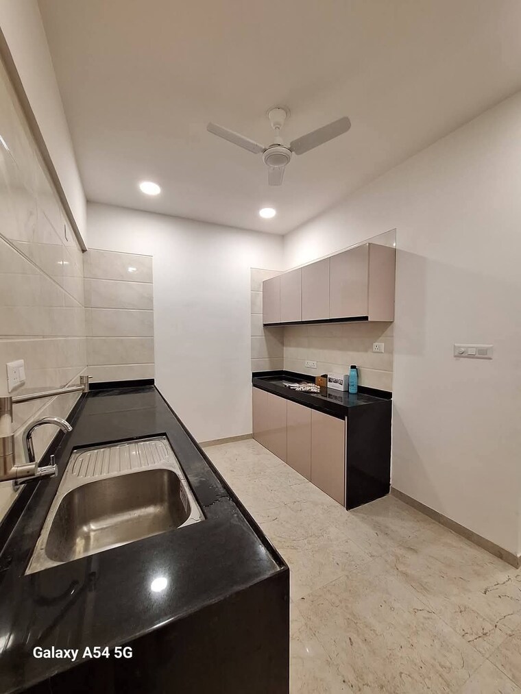 Kitchen, rama-metro-life-maxima-residences 2.5 Bedroom 900 Sq.Ft. Apartment In Tathawade Pune 9565745