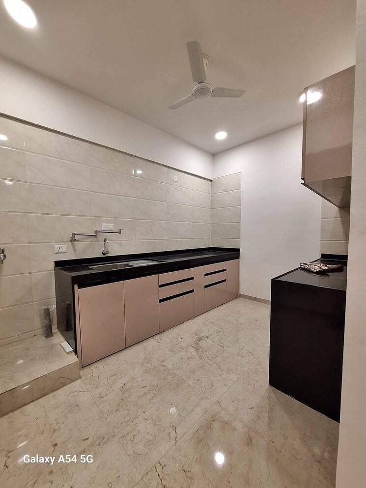 Kitchen, rama-metro-life-maxima-residences 2.5 Bedroom 900 Sq.Ft. Apartment In Tathawade Pune 9565745
