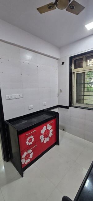 Kitchen in 2 BHK Apartment at Vasant Fiona, Pokhran Road No Two – for Rent
