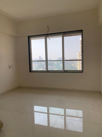 Room in 2 BHK Apartment at Glasswood Om Sarjan CHSL, Borivali West – for Sale
