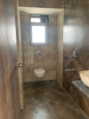 Bathroom in 2 BHK Apartment at Glasswood Om Sarjan CHSL, Borivali West – for Sale