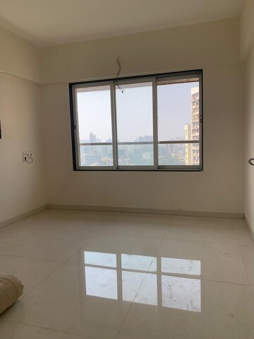 Room in 2 BHK Apartment at Glasswood Om Sarjan CHSL, Borivali West – for Sale