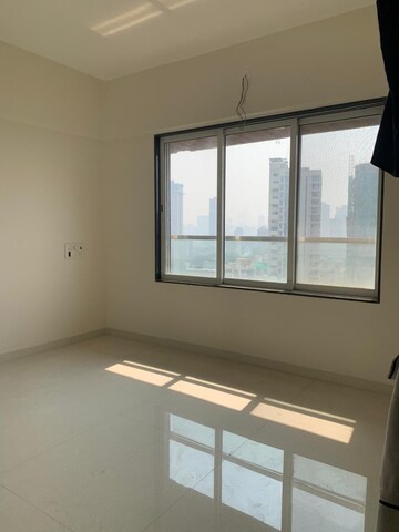 Room in 2 BHK Apartment at Glasswood Om Sarjan CHSL, Borivali West – for Sale