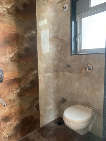 Bathroom in 1 BHK Apartment at Glasswood Om Sarjan CHSL, Borivali West – for Sale