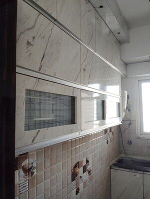 Kitchen in 2 BHK Apartment at Gaur City 2 - 14th Avenue, Sector 16c Greater Noida – for Rent