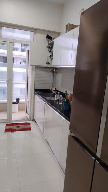 Kitchen in 2 BHK Apartment at Omkar Alta Monte, Malad East – for Rent