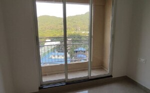 Balcony in 1 RK Apartment at JP North Elara, Mira Road – for Rent