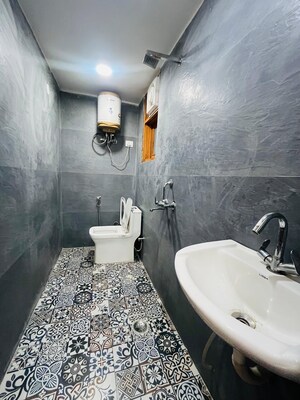 Bathroom in 1 BHK Apartment at Freedom Fighters Enclave – for Rent
