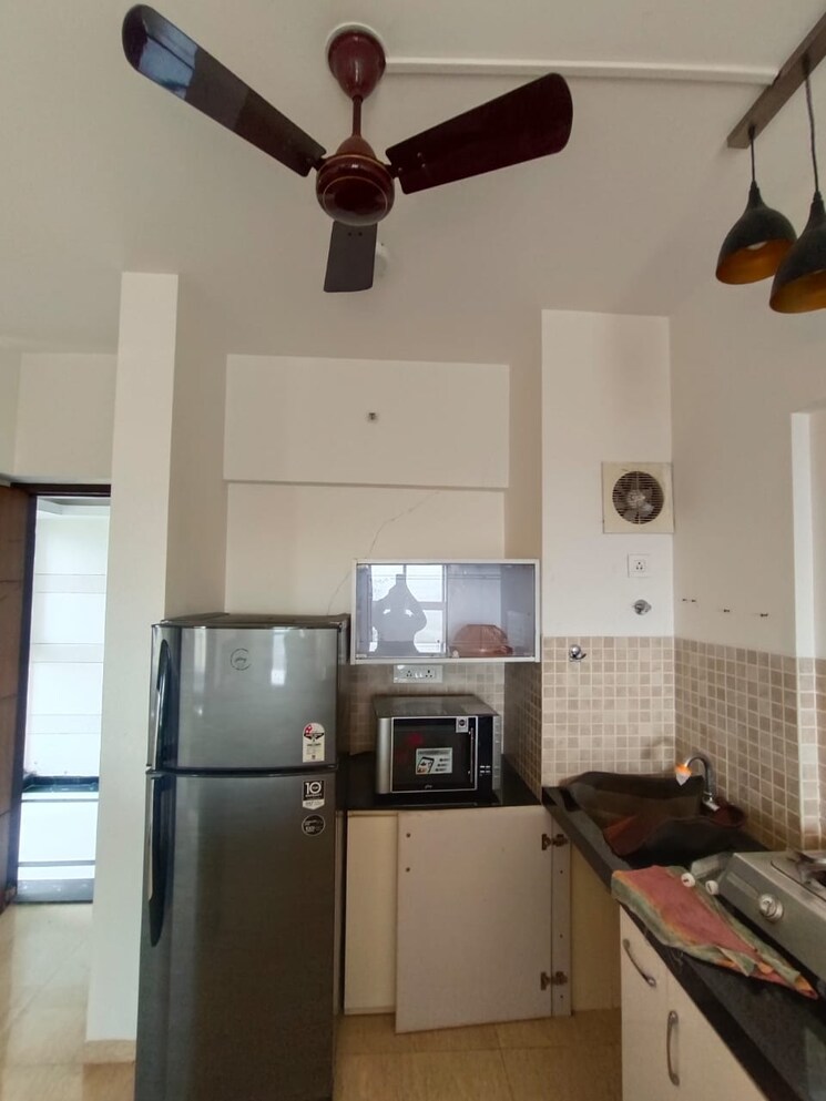 Kitchen, lodha-belmondo 1 Bedroom 711 Sq.Ft. Apartment In Gahunje Pune 9566014