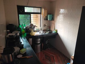 Kitchen in 2 BHK Apartment at Seawood Heritage, Kharghar Sector 4 – for Sale