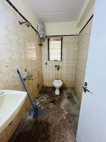 Bathroom in 2 BHK Apartment at Satellite Garden, Goregaon East – for Rent
