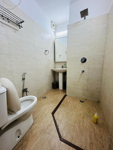 Bathroom in 1 BHK Builder Floor at Freedom Fighters Enclave – for Rent