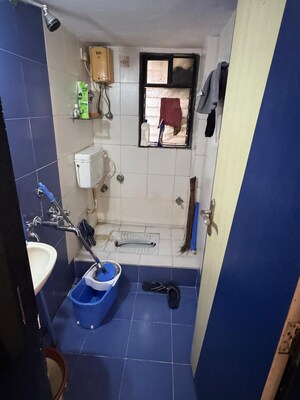 Master Bedroom in 2 BHK Apartment at Satellite Garden, Goregaon East – for Rent