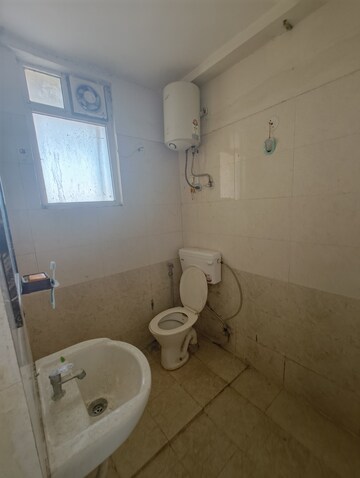 Bathroom in 1 BHK Apartment at Shree Vardhman Green Court, Sector 90 – for Sale