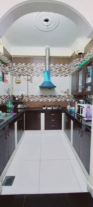 Kitchen in 3.5 BHK Apartment at Paras Tierea, Sector 137 – for Sale