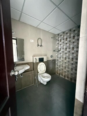 Bathroom in 3 BHK Apartment at Paras Tierea, Sector 137 – for Sale