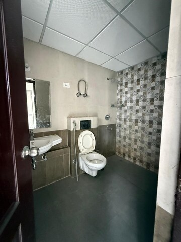 Bathroom in 3 BHK Apartment at Paras Tierea, Sector 137 – for Sale