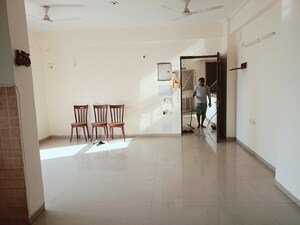Living Room in 2 BHK Apartment at Kendriya Lok Nirman CHS, Phi Iv Greater Noida – for Sale