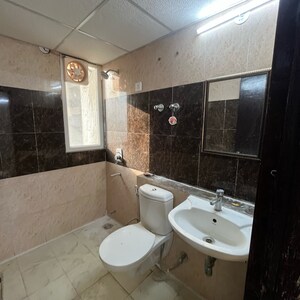 Bathroom in 3 BHK Apartment at Unnati Fortune The Aranya, Sector 119 – for Rent