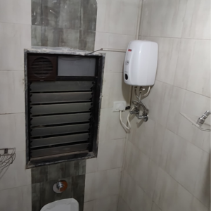 Bathroom in 2 BHK Apartment at Tilak Nagar – for Rent