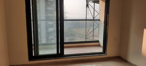 Room in 3 BHK Apartment at Cosmopolis Tower, Andheri West – for Sale
