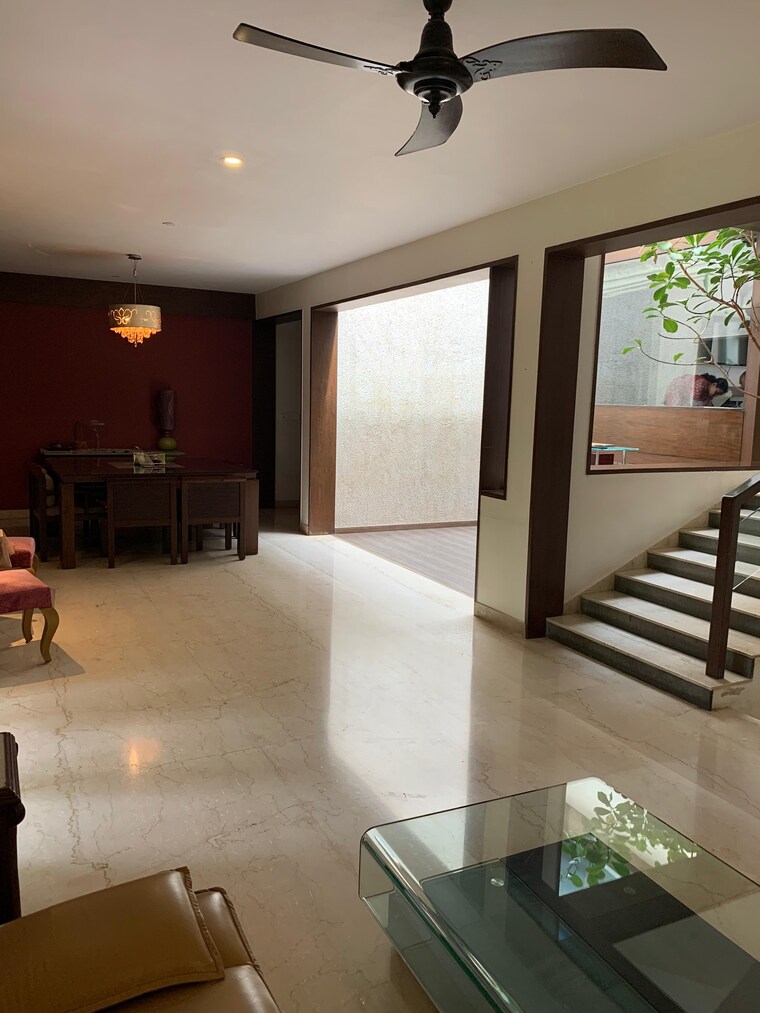 Living Room, value-designbuild-nusa-dua-phase-2 4 Bedroom 3828 Sq.Ft. Villa In Whitefield Bangalore 9567498