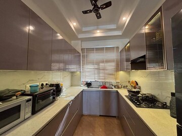 Kitchen in 3 BHK Apartment at Amrapali Golf Homes, Sector 4 Greater Noida – for Rent