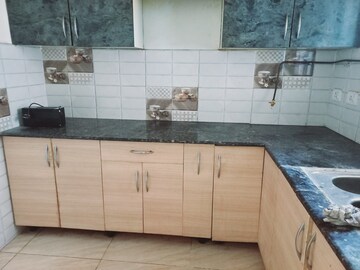 Kitchen in 2 BHK Apartment at Gaur City 2 - 14th Avenue, Sector 16c Greater Noida – for Rent