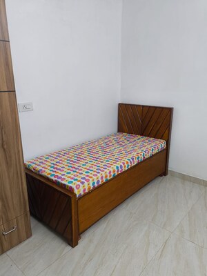 Bedroom in 2 BHK Builder Floor at DLF Star Tower, Sector 30 – for Rent