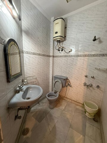 Bathroom in 3 BHK Builder Floor at Paschim Vihar – for Rent