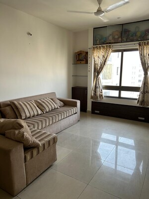Living Room in 1 BHK Apartment at Paranjape Blue Ridge, Hinjewadi – for Rent
