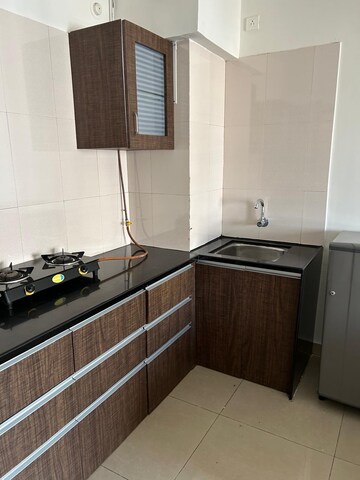 Kitchen in 1 BHK Apartment at Paranjape Blue Ridge, Hinjewadi – for Rent