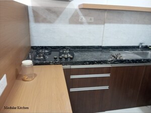 Kitchen in 1 RK Apartment at Gera World of Joy, Kharadi – for Rent