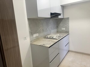 Kitchen in 3.5 BHK Builder Floor at DLF Gardencity Enclave, Sector 93 – for Rent