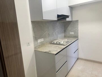 Kitchen in 3.5 BHK Builder Floor at DLF Gardencity Enclave, Sector 93 – for Rent