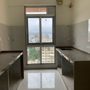 Kitchen in 3 BHK Apartment at Shraddha Elite, Poisar – for Rent