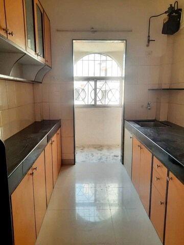 Kitchen in 1 BHK Apartment at Atul Blue Empire, Kandivali West – for Sale