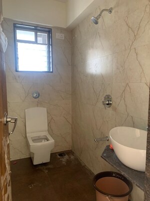 Bathroom in 1 BHK Apartment at Shubhabhumi Patkeshwar Apartment CHSL, Borivali West – for Sale