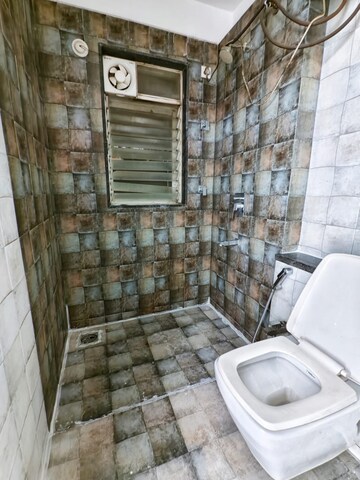 Bathroom in 2 BHK Apartment at Vadgaon Budruk – for Sale