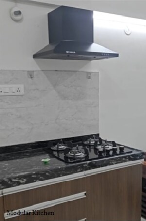 Kitchen in 1 RK Apartment at Gera Song Of Joy, Kharadi – for Rent