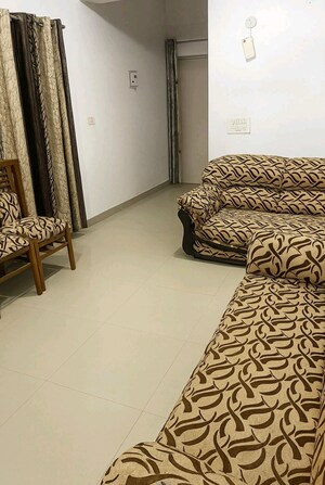 Living Room in 2 BHK Apartment at Adore Happy Homes Grand, Sector 85 – for Rent