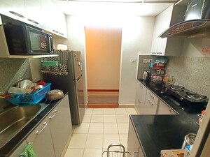 Kitchen in 3 BHK Apartment at Bptp Park Floors I, Sector 77 – for Rent