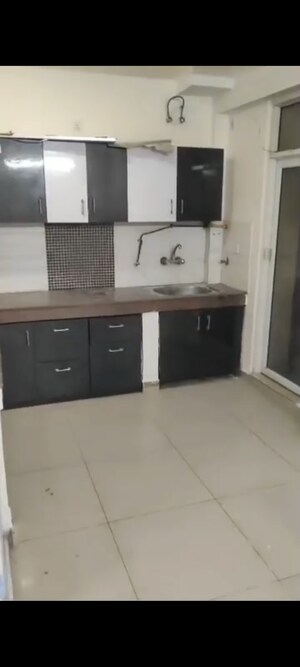 Kitchen in 3 BHK Apartment at Exotica Dreamville, Sector 16c Greater Noida – for Rent