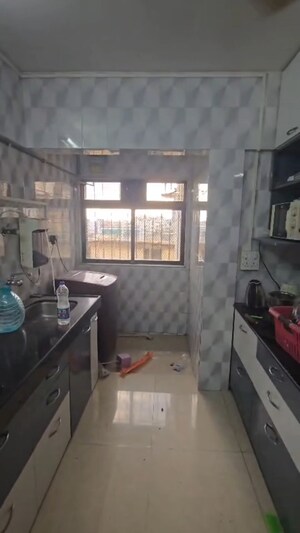 Kitchen in 3 BHK Apartment at Charmee Enclave, Vile Parle East – for Sale