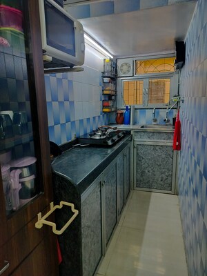 Kitchen in 2 BHK Apartment at Santacruz West – for Sale