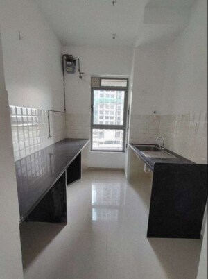 Kitchen in 2 BHK Apartment at Kalpataru Immensa, Kolshet Road – for Rent