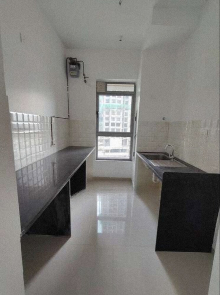 Kitchen, kalpataru-immensa 2 Bedroom 637 Sq.Ft. Apartment In Kolshet Road Thane 9570162